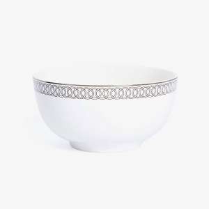 Elegant Porcelain Bowl with Geometric Silver Rim